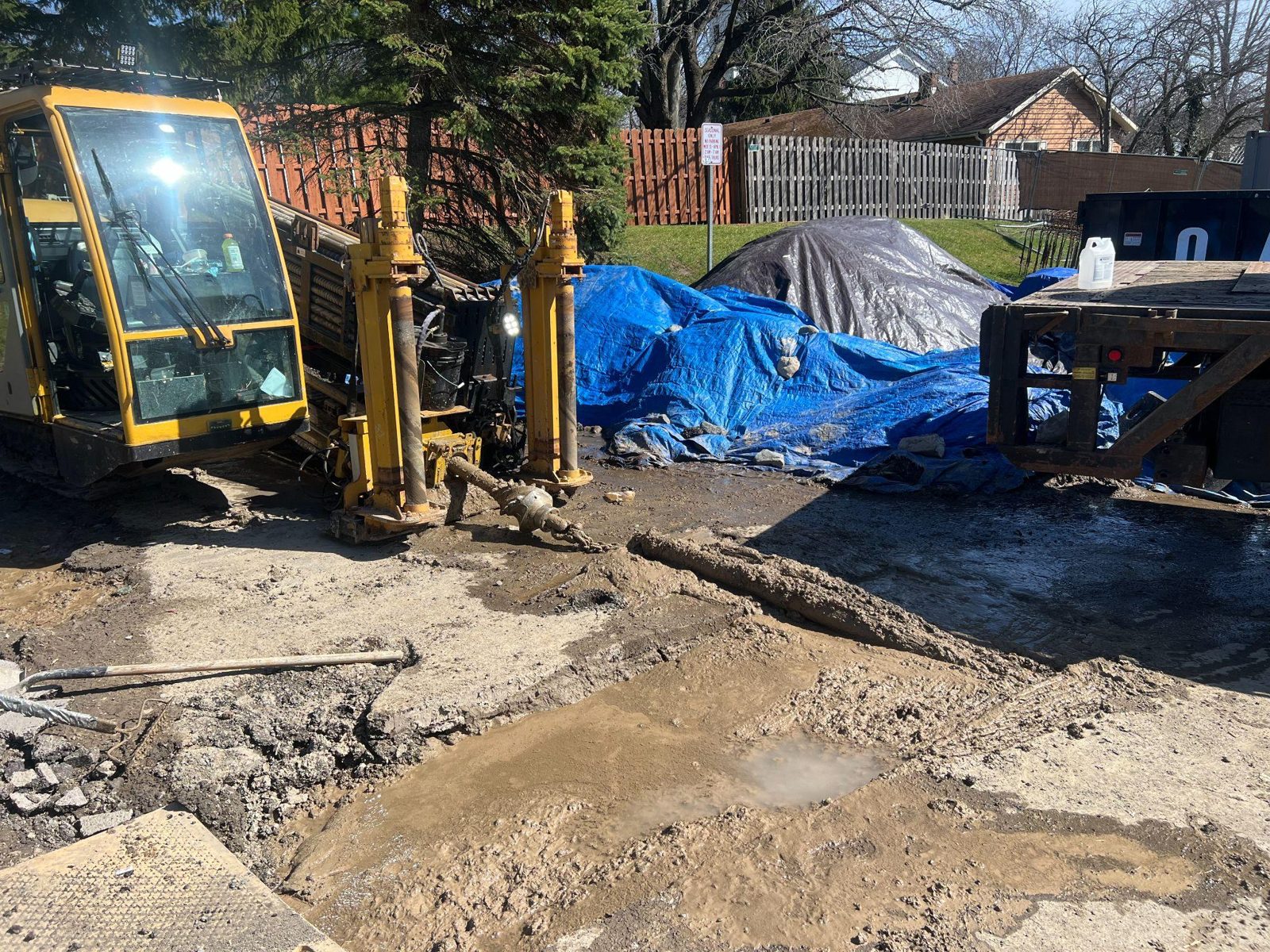 Directional drill rig boring under an obstacle on a solar field